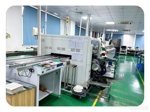 Close-up of SMT LED chip mounting process on PCB strip